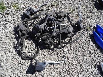 SUZUKI BURGMAN K5 UH 125 ЗАЖИМ+ТОРМОЗНОЙ НАСОС. ФРОНТ 00-06