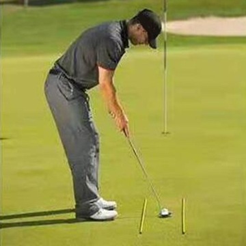 Golfowe kije wyrównujące żółte