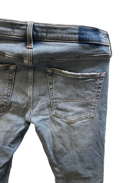 Spodnie jeansy męskie Hollister W32 L32 niebieskie