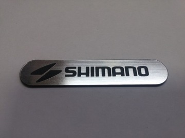 SHIMANO naklejka emblemat 60 x 12 mm * SREBRNA