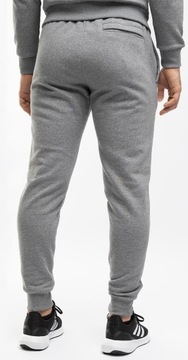 Under Armour spodnie dresowe męskie sportowe joggery Rival Fleece roz.M