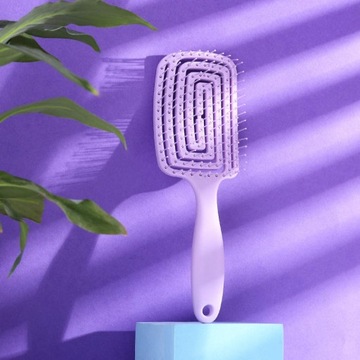 Спиральная массажная щетка для распутывания волос.