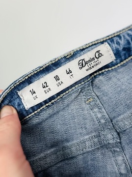 Jeansowe elastyczne spodnie rurki dziury XL 42 Denim Co.