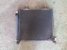 CHLADIČ KLIMATIZACE SUZUKI IGNIS I 1.3 00-03