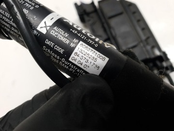 НАТЯЖИТЕЛЬ РЕМНЯ ПЕРЕДНЕГО СПРАВА OPEL CORSA D