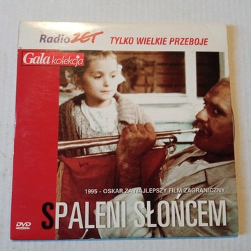 FILM - SPALENI SŁOŃCEM - PŁYTA DVD.