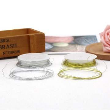 Рулон стальной проволоки диаметром 0,4 мм длиной 10 м.