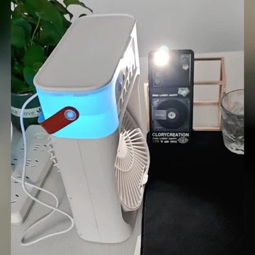 Многофункциональный электрический вентилятор с пятью отверстиями и функцией увлажнения воздуха.