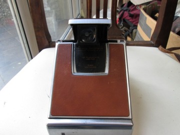 Наземная камера Polaroid SX-70 МЕТАЛЛИЧЕСКИЙ КОРИЧНЕВЫЙ ФУНКЦИОНАЛЬНЫЙ