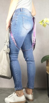 Spodnie jeans rurki z przetarciami rozm. M (38)