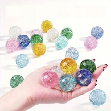 100x PIŁECZKI PIŁKI KULKI KAUCZUKOWE BROKATOWE SKACZĄCE SENSORYCZNE 27mm