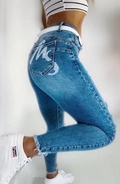 Spodnie jeansy rurki z przetarciami dziurami 34
