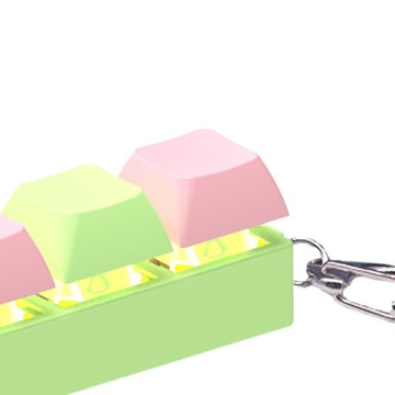 Непоседа-клавиатура Сенсорная игрушка Креативная игрушка с механическими клавишами зеленого и розового цвета