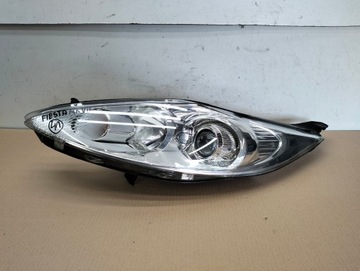 LAMPA LEWA PRZOD FORD FIESTA MK7 VII LATA 2008-2012 PRZEDLIFT SOCZEWKA