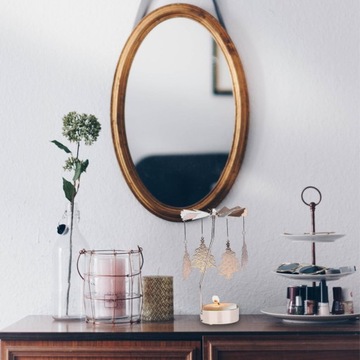 Украсьте подвесной подсвечник в виде сосны.