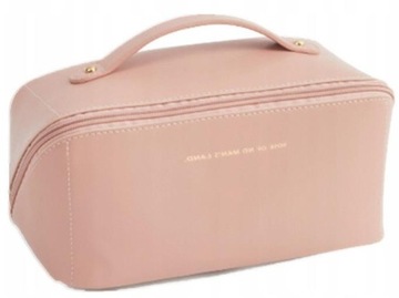 Большая женская дорожная косметичка из бежевой кожи.