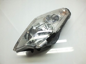 LAMPA LEWY PRZÓD PEUGEOT SATELIS 125 06-