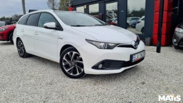 Toyota Auris II Touring Sports Facelifting 1.8 Hybrid 136KM 2016 Toyota Auris 1.8Hybryda Panorama Navi kamera climatronic 100 bezwypadek, zdjęcie 17