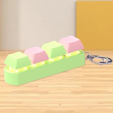 Непоседа-клавиатура Сенсорная игрушка Креативная игрушка с механическими клавишами зеленого и розового цвета