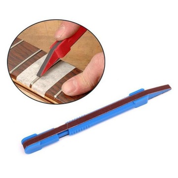 Инструмент для выравнивания концов ладов гитары, напильник.