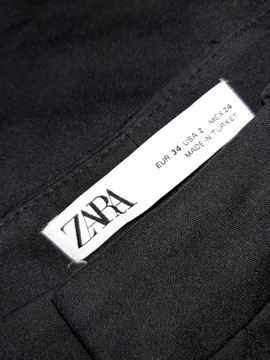 ZARA czarne cygaretki asymetryczne nogawki r 34