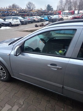 KLIKA LEVÝ PŘEDNÍ OPEL ASTRA H 04-11 KOMBI Z163