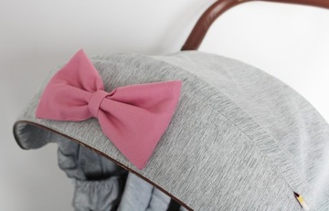 Малиново-розовый бантик на коляску.