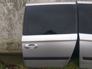 Drzwi lewe tył Chrysler G.Voyager IV lift