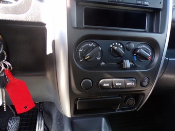 Suzuki Jimny III Standard 1.3 VVT 85KM 2009 SUZUKI JIMNY 1.3 BENZ AUTO Z NIEMIEC 4X4 NAPĘD, zdjęcie 11