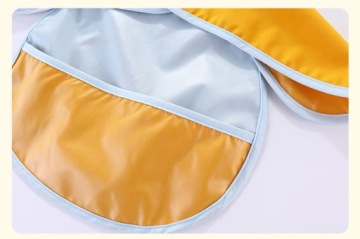 НАГЛАЖНИК ДЛЯ КОРМЛЕНИЯ, КАРМАННЫЙ МАТЕРИАЛ