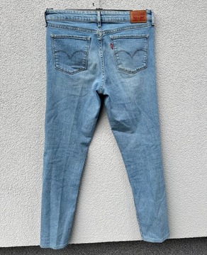 Levis 711 Skinny W31 niebieskie jasne baby blue spodnie jeansowe damskie