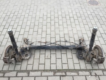 BELKA OŚ TYLNA TARCZE TOYOTA YARIS II , III
