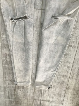 H&M spodnie JEANS rurki DZIURY 42 XL