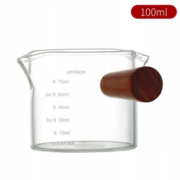 Стеклянный кувшин с мерной чашкой для эспрессо.