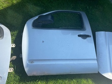 DVEŘE LEVÉ PŘEDNÍ NISSAN NAVARA III D40 PATHFINDER R51 2005-2010