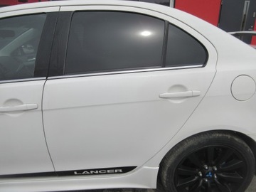 DVEŘE LEVÝ ZADNÍ LANCER VIII W37 W37B SEDAN