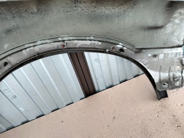 BLOTNIK LEWY PRZOD VOLVO XC90 I LIFT SREBRNY 2007-2014