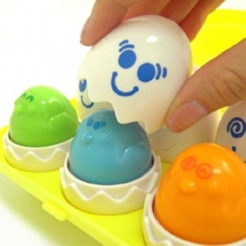 TOMY HAPPY EGGS Сортировщик яиц со звуком для малышей