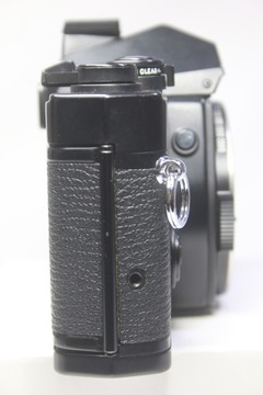 Пленочная зеркальная камера Olympus OM-4 + объектив Auto-S 50 мм F1,4 + электронная вспышка T32