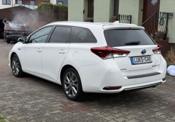 Toyota Auris II Touring Sports Facelifting 1.8 Hybrid 136KM 2015 Toyota Auris 1,8 HYBRID Lift Kamera KEY-LESS PDC Bezwypadkowy ASO Dla wyma, zdjęcie 5
