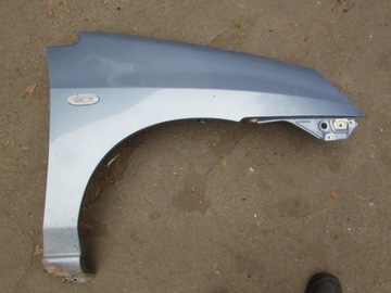 BLATNÍK PRAVÝ SUZUKI LIANA FACELIFT KOL.ZE9