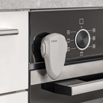 Защита дверцы духовки самоклеющейся лентой 3M REER