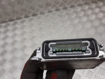 MĚNIČ BI-XENON OPEL VECTRA C 1.9 CDTI 89034934
