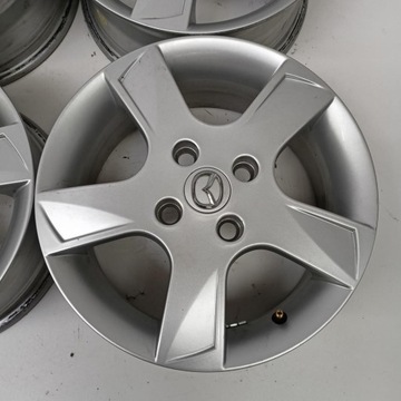 ALU RÁFKY 4X108 15 MAZDA 2 4M71-AA 4KS (E4222)