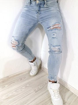 Spodnie męskie jeans jasne dziury przetarcia 36