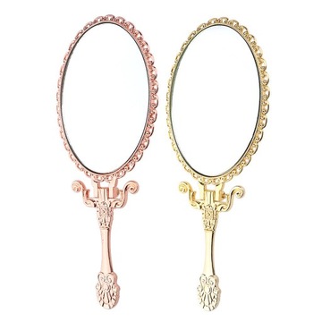 Винтажное ручное зеркало для макияжа из нержавеющей стали.