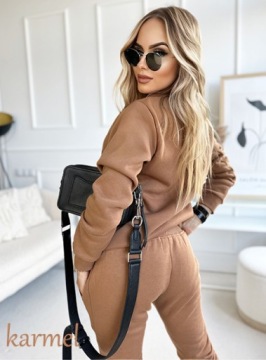 Уникальный, красивый, женственный спортивный костюм разных цветов.