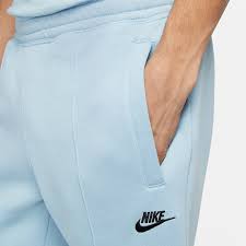 Spodnie dresowe Nike męskie DO0022-416 niebieskie r. XS
