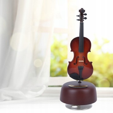 Скрипка в форме вращающейся деревянной музыкальной шкатулки.