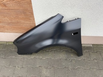 VW CADDY 2004 - BŁOTNIK PRZEDNI LEWY NOWY